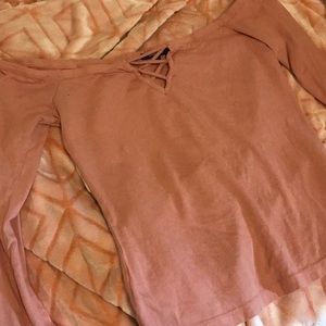 It’s a pink ambiance long sleeve shirt.